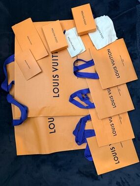 Authentic Louis Vuitton Orange Shopping Bags and Gift Boxes with Blue Ribbons